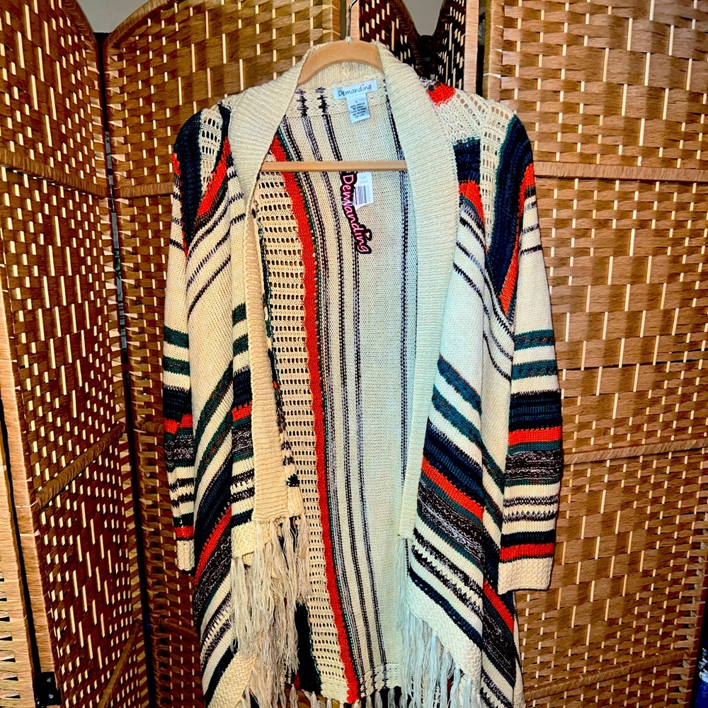 Beautiful, fringed, duster. Burnt Orange, forest, and cream combo. So adorable!